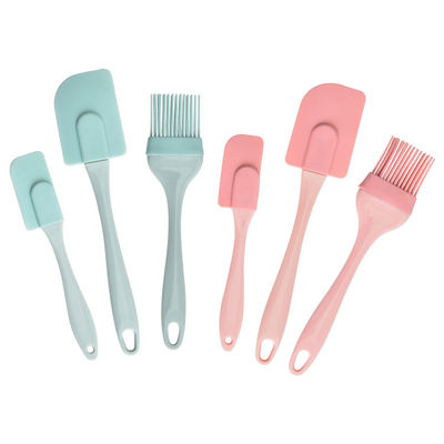Raspador de silicona rosa Conjunto de tres piezas Espátulas resistentes al calor Herramientas de hornear con cepillo de barbacoa