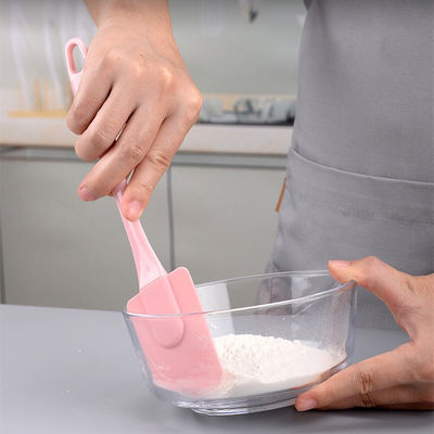 Raspador de silicona rosa Conjunto de tres piezas Espátulas resistentes al calor Herramientas de hornear con cepillo de barbacoa