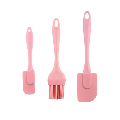 Raspador de silicona rosa Conjunto de tres piezas Espátulas resistentes al calor Herramientas de hornear con cepillo de barbacoa