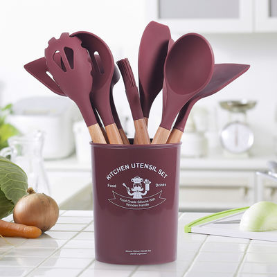 Conjunto de utensilios de cocina de silicona de 12 piezas con asas de madera El mejor amigo de su cocina