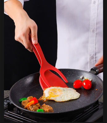 Clip de comida conveniente 2 en 1 para recoger huevos y voltear carne en cocina sostenible