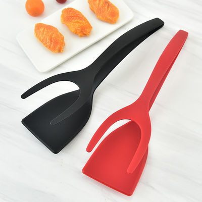 Clip de comida conveniente 2 en 1 para recoger huevos y voltear carne en cocina sostenible